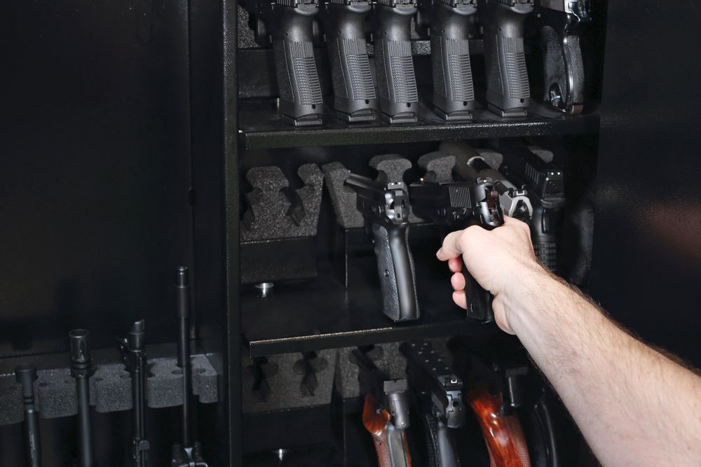 How should I store my firearms?